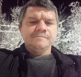 Николай