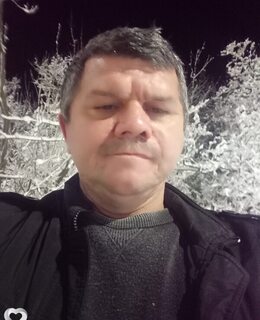 Николай
